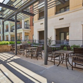 Enjoy our resident-only features a patio with tables and chairs
