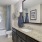 a bathroom with a marble countertop