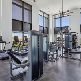 Cutting-edge amenities at your fingertips a gym with exercise equipment